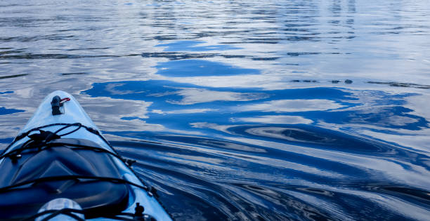 istock Blue kayak, blue water, blue sky 1470383633