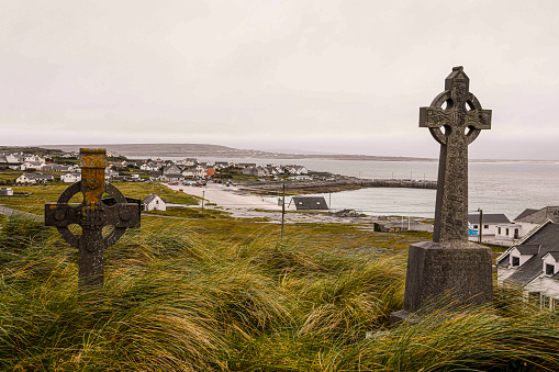 Celtic cross on small island town in Ireland in Ireland, England, United Kingdom