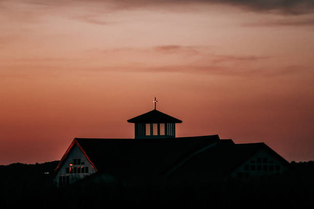 istock church and cross at sunet 1470386713