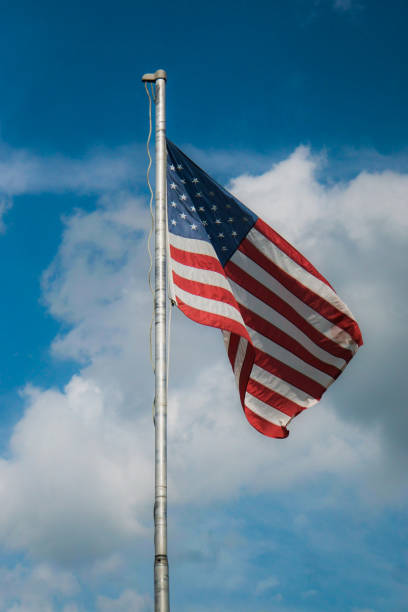 istock American flag blowing in the wind 1470388845