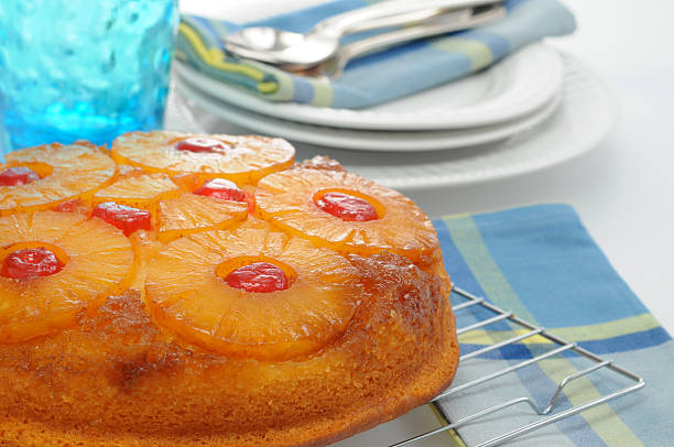 istock Freshly baked upside down pineapple cake on rack 147039087