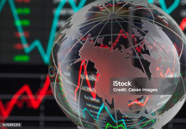Financial Markets Globe Of Us With Data And Graphs Reflecting Stock Photo - Download Image Now