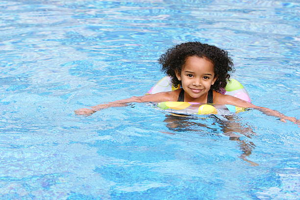 Afro Child Swimming stock photo