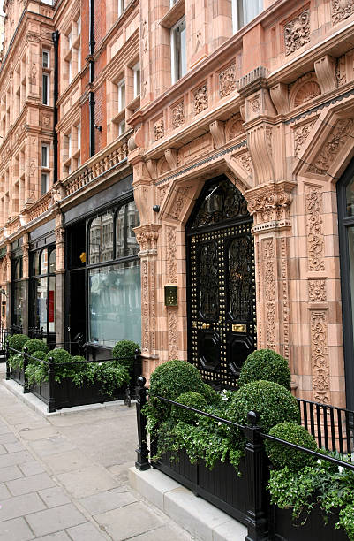 Old Buildings in Mayfair Elegant apartment building with shops on the lower level. Mayfair stock pictures, royalty-free photos & images
