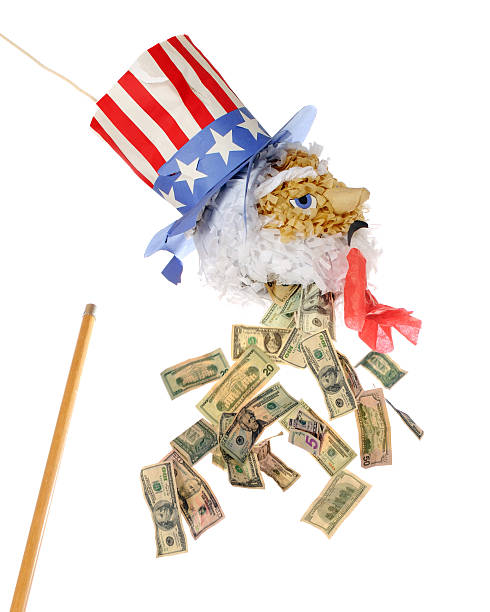 Uncle Same Bleeding Money A homemade Uncle Sam Pinata with multiple bills falling from his broken head. Isolated on white. uncle sam broke stock pictures, royalty-free photos & images