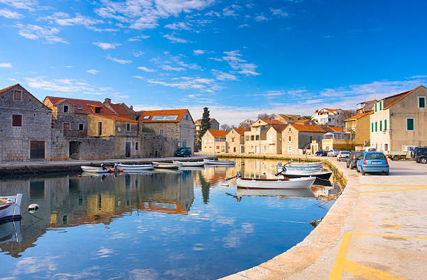 istock mediterranean town parted with channel (Croatia, Hvar) 147040230