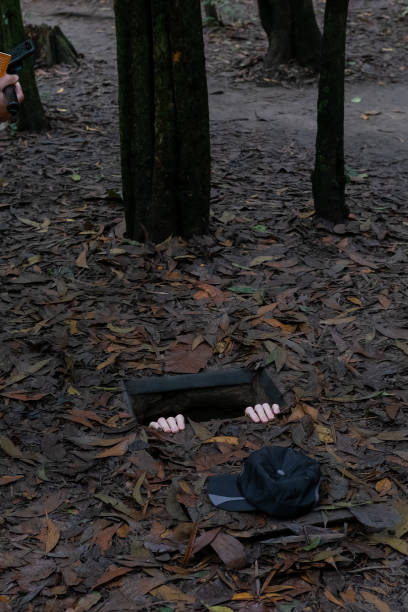 istock Hands Reach from Trap Door 1470403560
