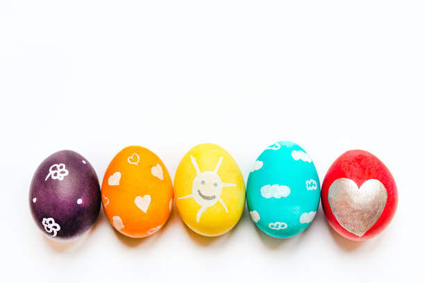 istock Charmingly colorfully decorated Easter eggs with child's paintings. Funny festive preoccupations 1470404392