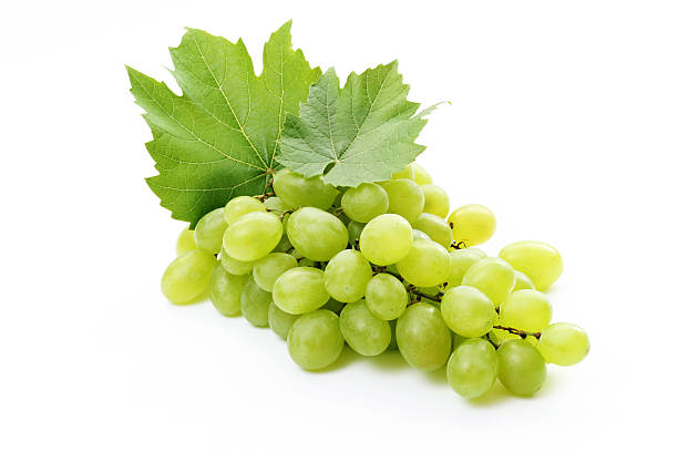 istock A bunch of green grapes with leaves on a white background 147040730