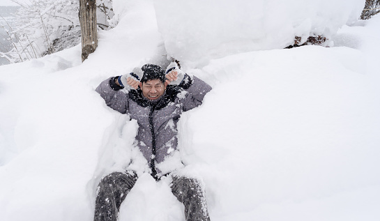 Travel at Shirakawa-go village with white thick snowing, the best for tourist travelling in Japan at winter.