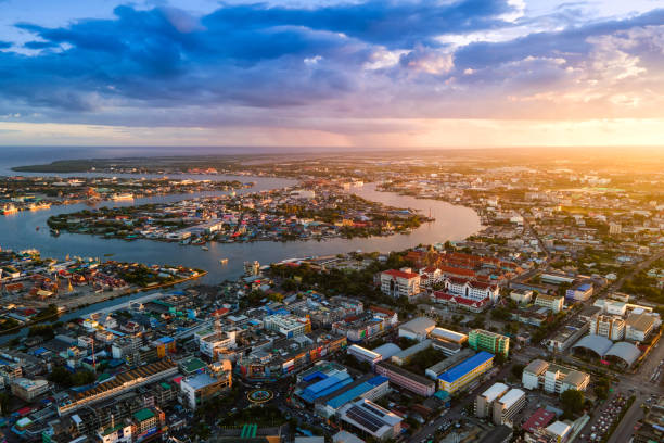 Aerial view of Houses and communities at Samut Sakhon District in sunset, Samut Sakhon,Thailand stock photo