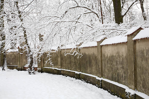 istock Old fence in a snow 147041354