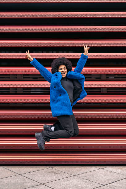 istock Happy Afro Woman Posing 1470416895