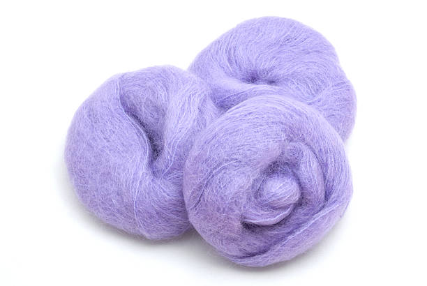 istock Three purple balls of yarn 147041745