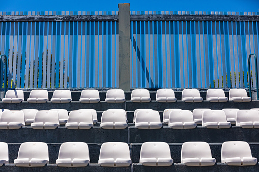 Blue sittings of stadium's stand