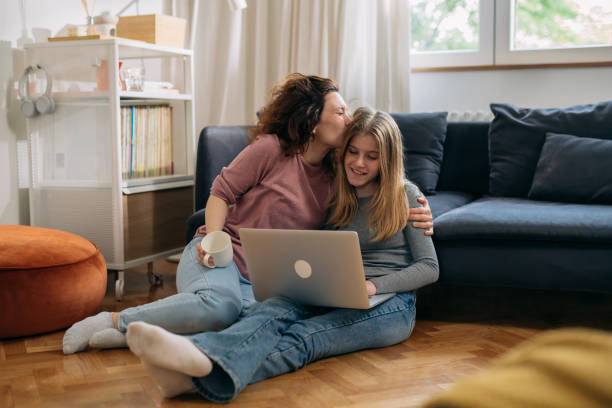 istock mother and daughter enjoying time at home 1470421843