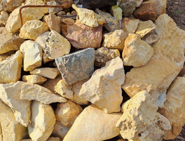istock big stones yellow sand and grey background 1470422939
