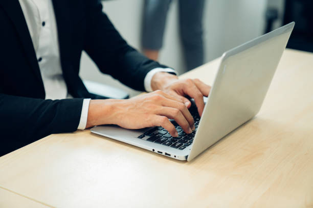 istock Businessman typing keyboard on laptop or computer. 1470427511