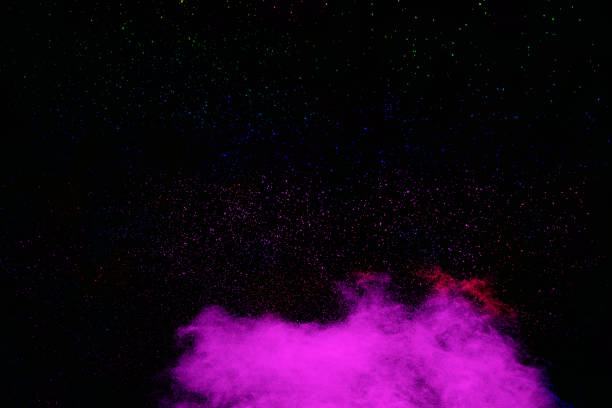 istock Purple color powder explosion cloud  on black background.Purple dust particles splash. 1470428861