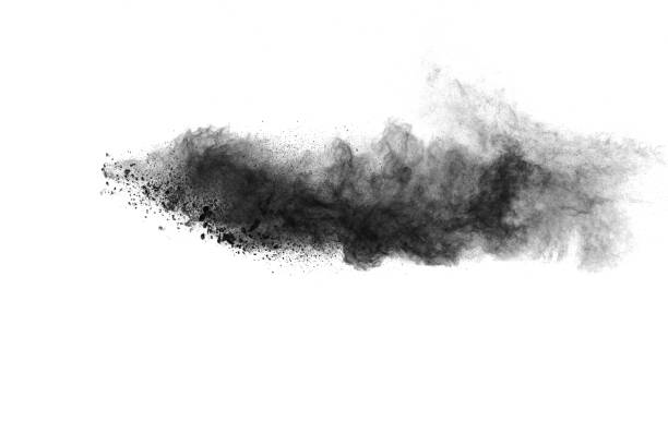 istock Black powder explosion against white background. Black dust particles splashing. 1470428888