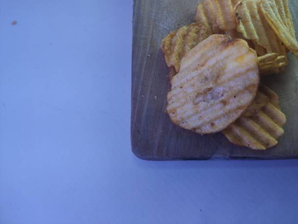 istock wavy potato chips, barbecue flavor, very tasty, 1470430202