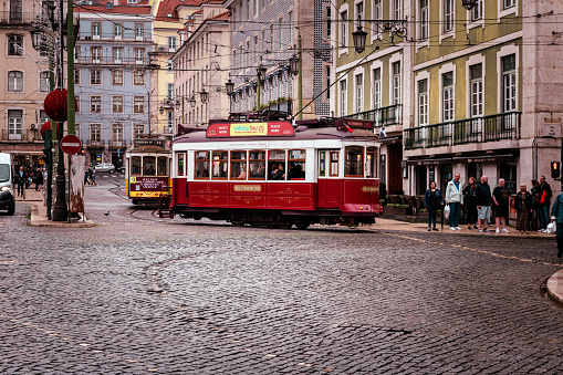 Lisbon, Portugal - November 03, 2022: red tram in the streets of Lisbon