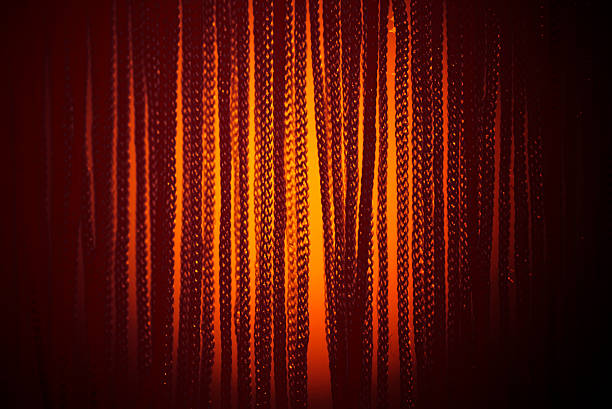 curtain and sun stock photo