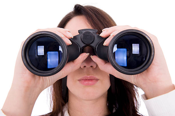 istock A picture of a woman using binoculars 147043272