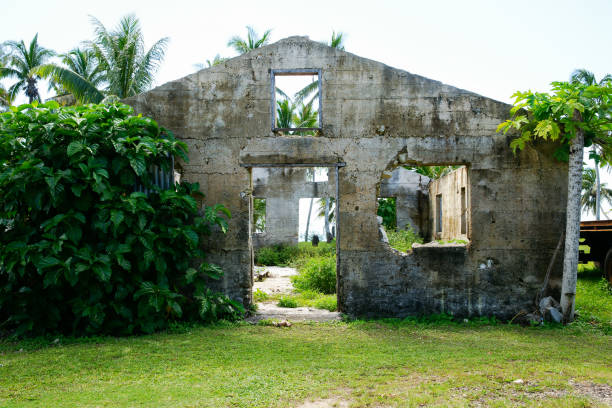 istock Deserted concrete building facade with door and windows open 1470434156