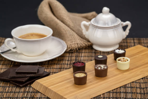 istock Porcelain coffee cup with delicious chocolate candies 1470434184
