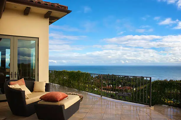 High up Malibu view from patio of luxurious modern house.