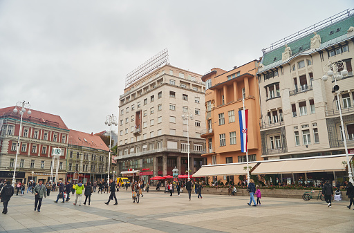 Zagreb, Croatia - October 20, 2022: Ban Josip square with walking people. The central square of the city of Zagreb. High quality photo