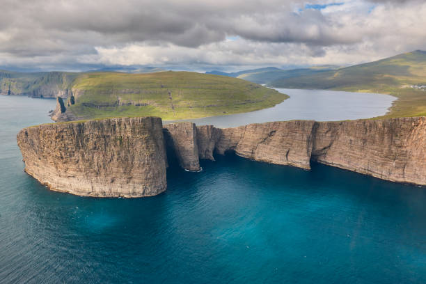 istock Faroe islands dramatic coastline in Vagar. Leitisvatn lake. Atlantic ocean 1470437229
