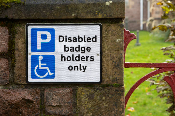 istock Disabled parking sign on a church wall 1470439957