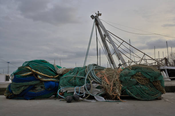 istock Fishing nets on the harbour quay 1470444660