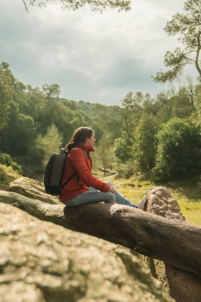 istock Woman standing in beautiful landscape 1470444971