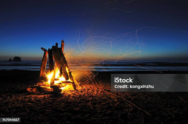 Campfire On Shishi Beach Stock Photo - Download Image Now - Beach, Bonfire, Fire - Natural Phenomenon