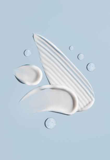 istock cosmetic smears cream texture on pastel blue background 1470445922