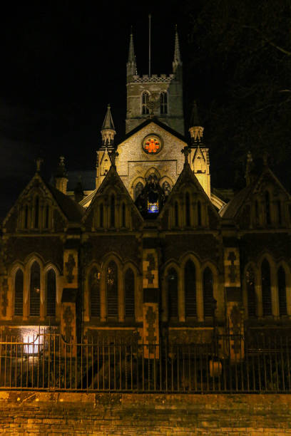 The 800 year old Southwark Cathedral in London at night stock photo