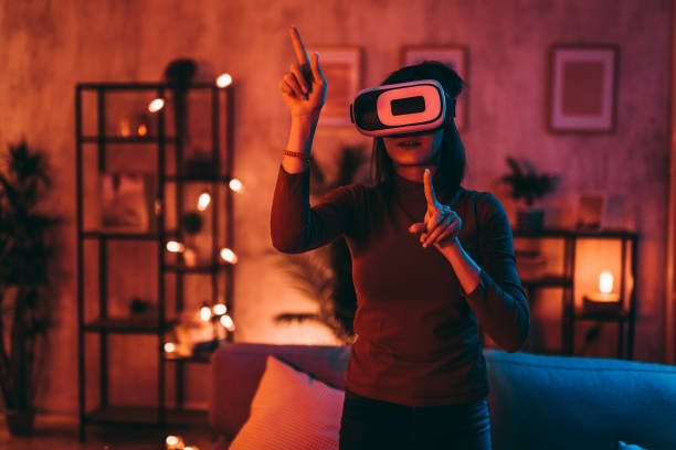istock Young Woman Wearing A Virtual Reality Headset At Home 1470448813
