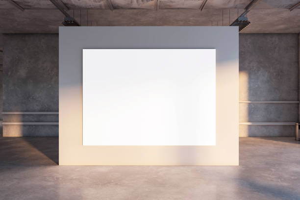 istock Front view on big blank white poster with space for your text or advertising logo on sunlit beige partition in empty concrete hall with water pipes on background. 3D rendering, mock up 1470448842