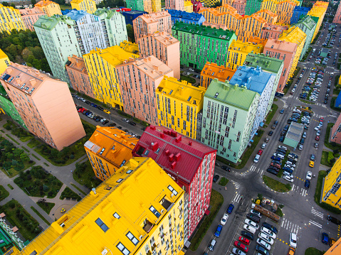Aerial view of a residential complex with rainbow houses on the left bank of Kyiv
