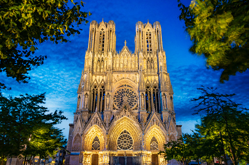 REIMS, FRANCE - AUG 6, 2022: Cathedral of Our Lady of Reims, France after sunset