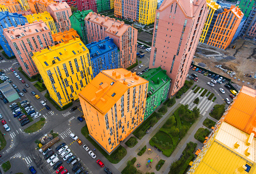 Aerial view of a residential complex with rainbow houses on the left bank of Kyiv