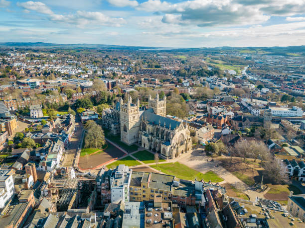 Exeter Cathedral and wider city in Devon Exeter Cathedral and wider city in Devon exeter england stock pictures, royalty-free photos & images