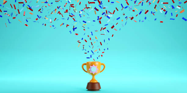 istock 3D render of Winner trophy cup with falling color confetti, championship moment 1470453270