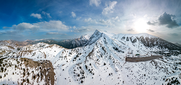 Aerial panoramic photo of the top of Aroania Chelmos Mountain at a sunny day of winter in Kalavryta, Peloponnese