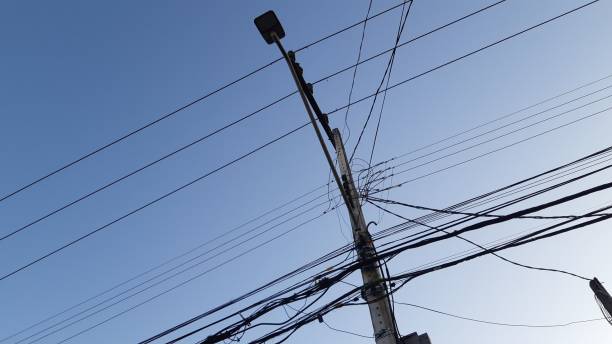 istock Tangle of wires on a pole 1470459522