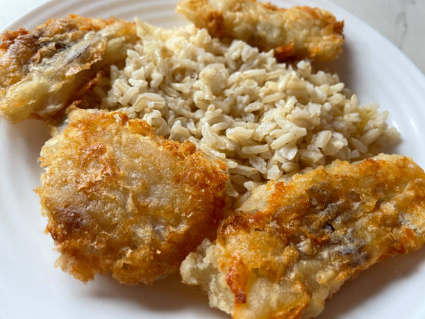 Bowl with roasted pollock and porridge.