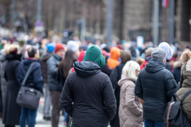 istock group of unrecognizable protesters gathered in the street 1470461439